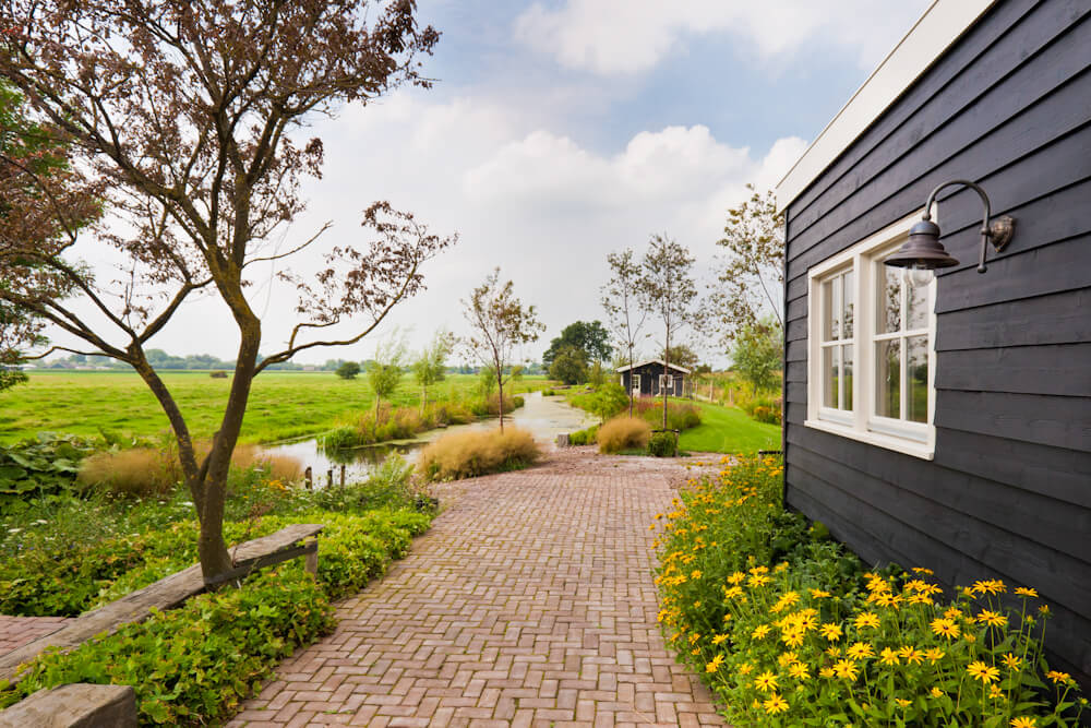 Fotoreportage van tuin in Snelrewaard voor Groenregie